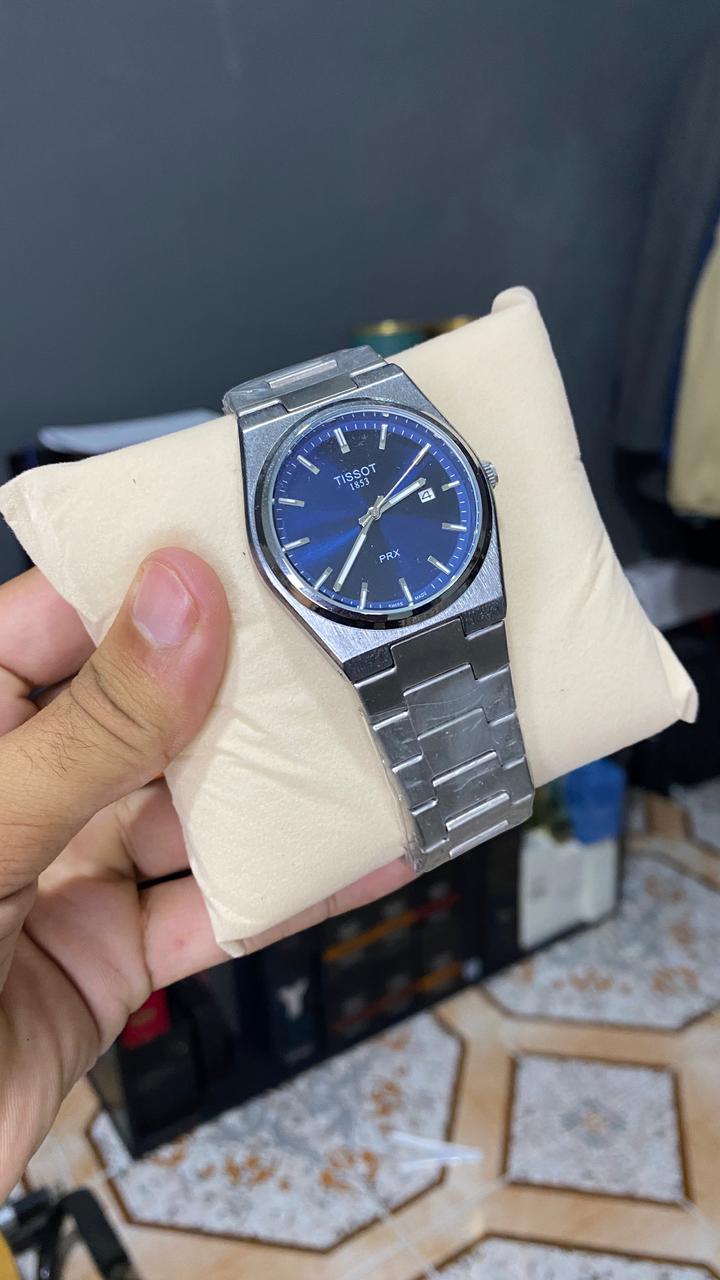 TISSOT ACIER GRIS TABLEAU BLEU